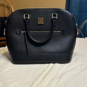 Dooney & Bourke Black Purse with Gold Accents. New. Never used.